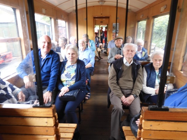 Newport VIP Group members seated in one of the railway's carriages