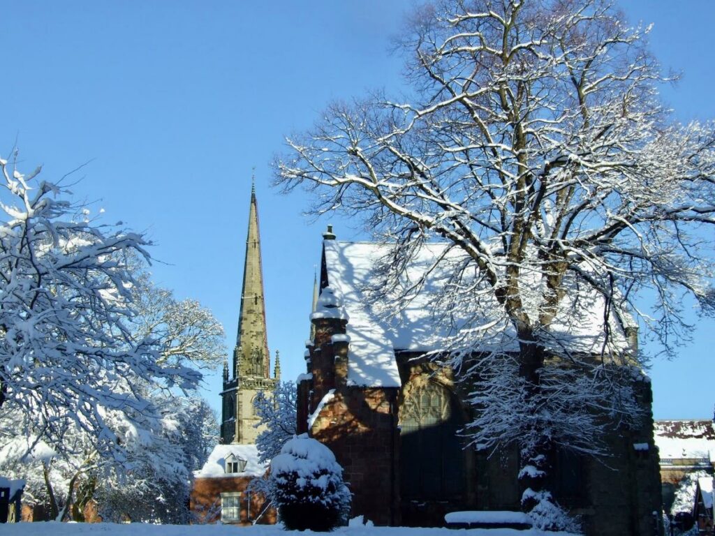 A photograph depicting St Julian's steeple in Shrewsbury covered in snow. © Sight Loss Shropshire