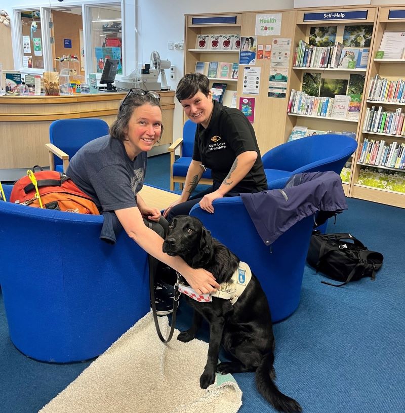 Lottie, guide dog Olive and tech trainer Vicki at the Lantern library in Harlescott. 